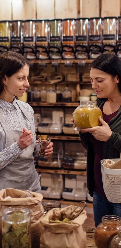 two women sampling health foods at a natural foods grocery loudbird digital marketing