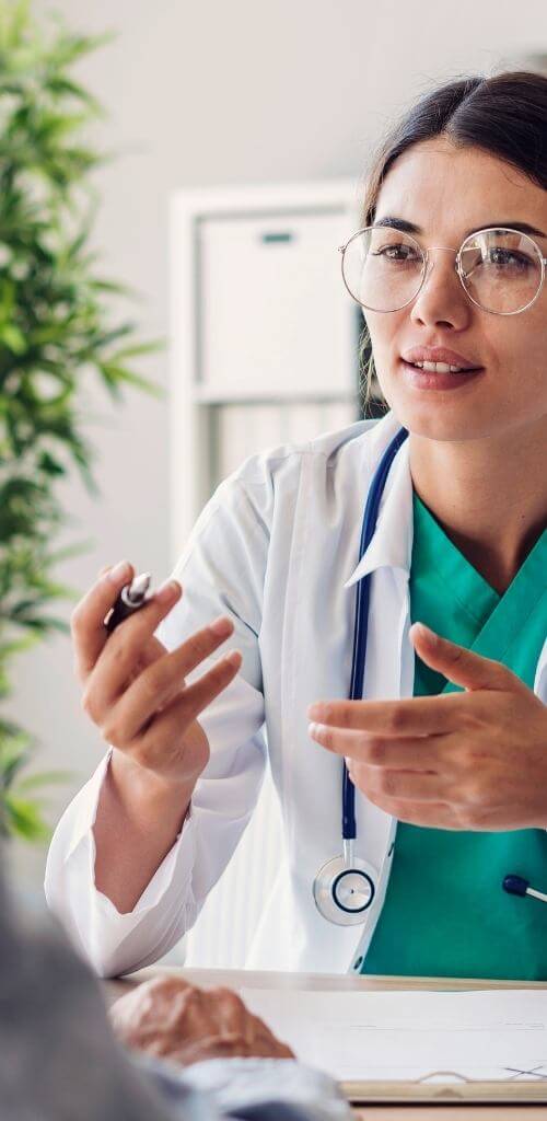 female doctor talking through a diagnosis with her patient medical marketing for doctors and medical clinics loudbird marketing